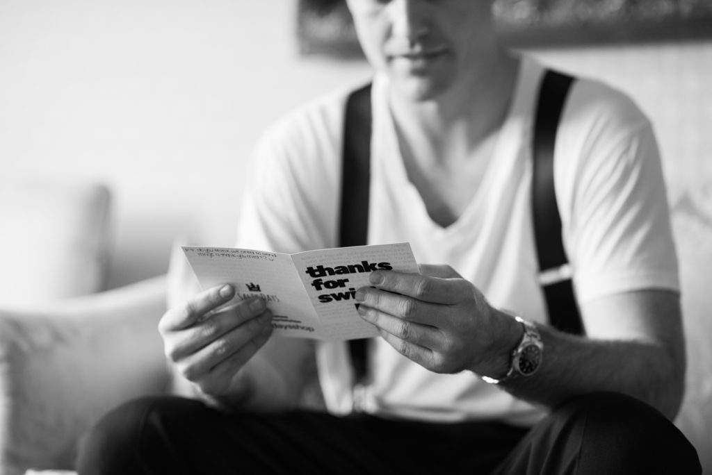 groom opening card with title 