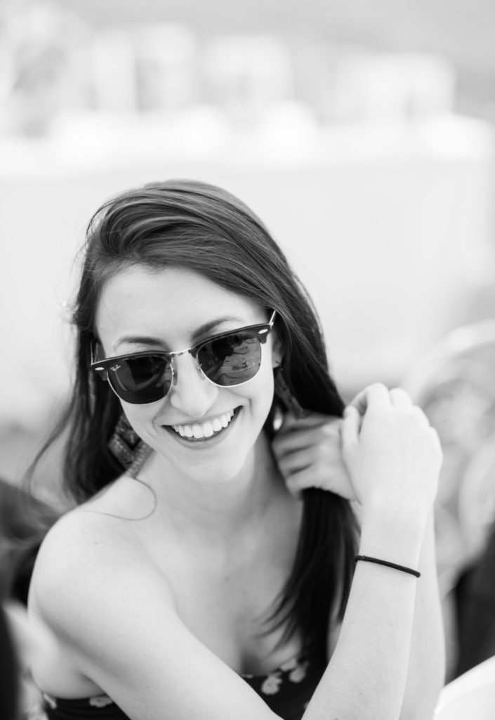 smiling woman with shades
